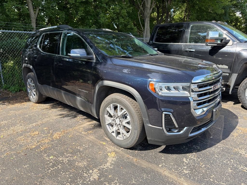 2021 GMC Acadia SLT in Midnight Blue Metallic — front three-quarter view