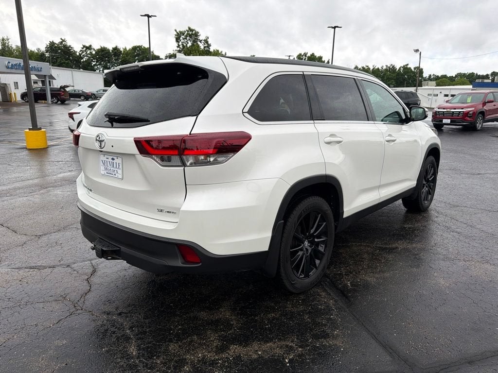 2019 Toyota Highlander — rear three-quarter view